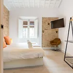 Te1A-El Teatro Brick Wall Suite Prime Location
