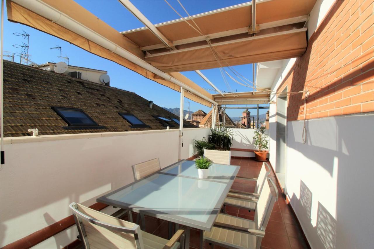 Homes Atico Larios Apartment