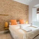 Te1A-El Teatro Brick Wall Suite Prime Location